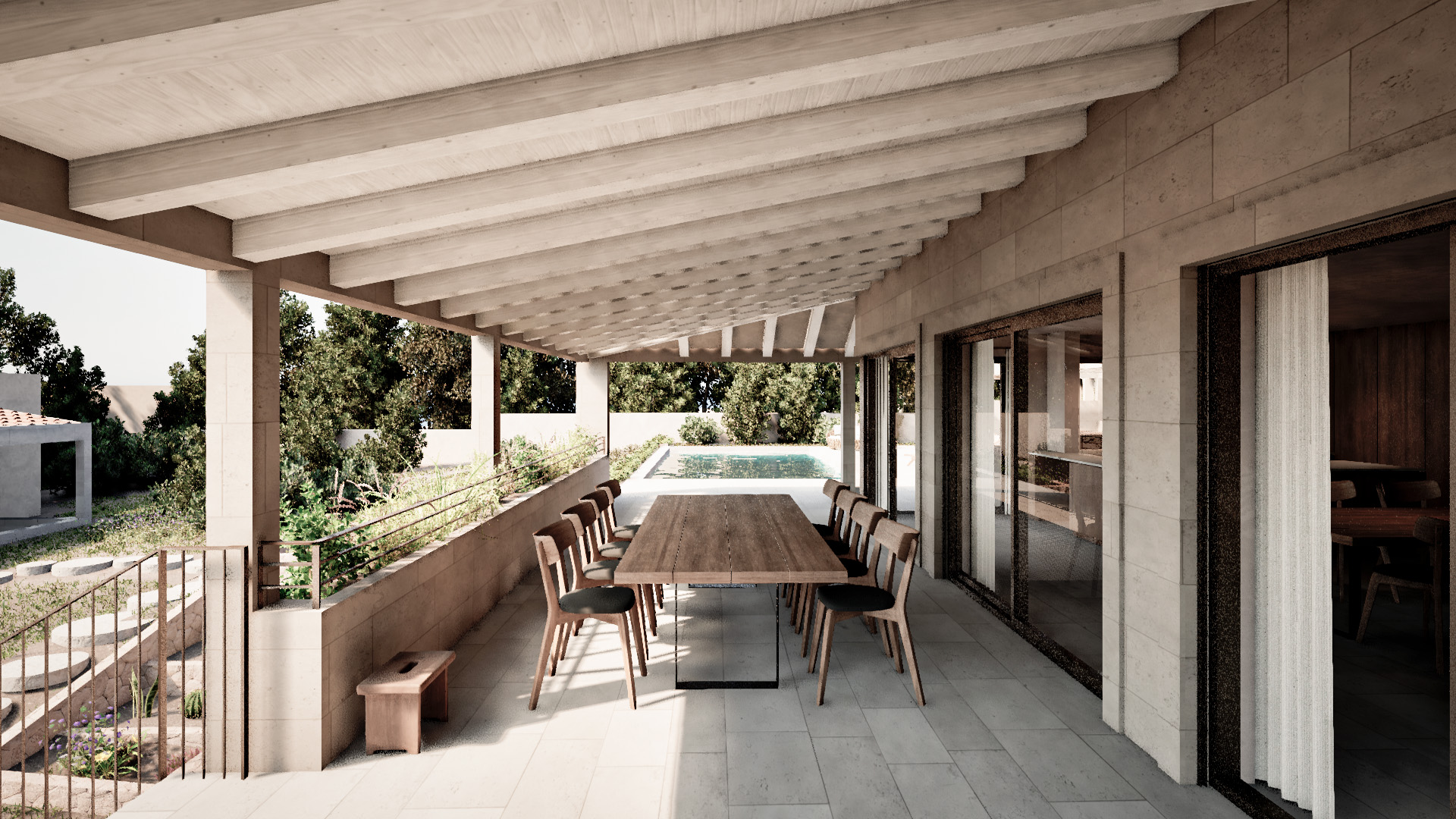 Covered porch with dining table at the Betlem residence
