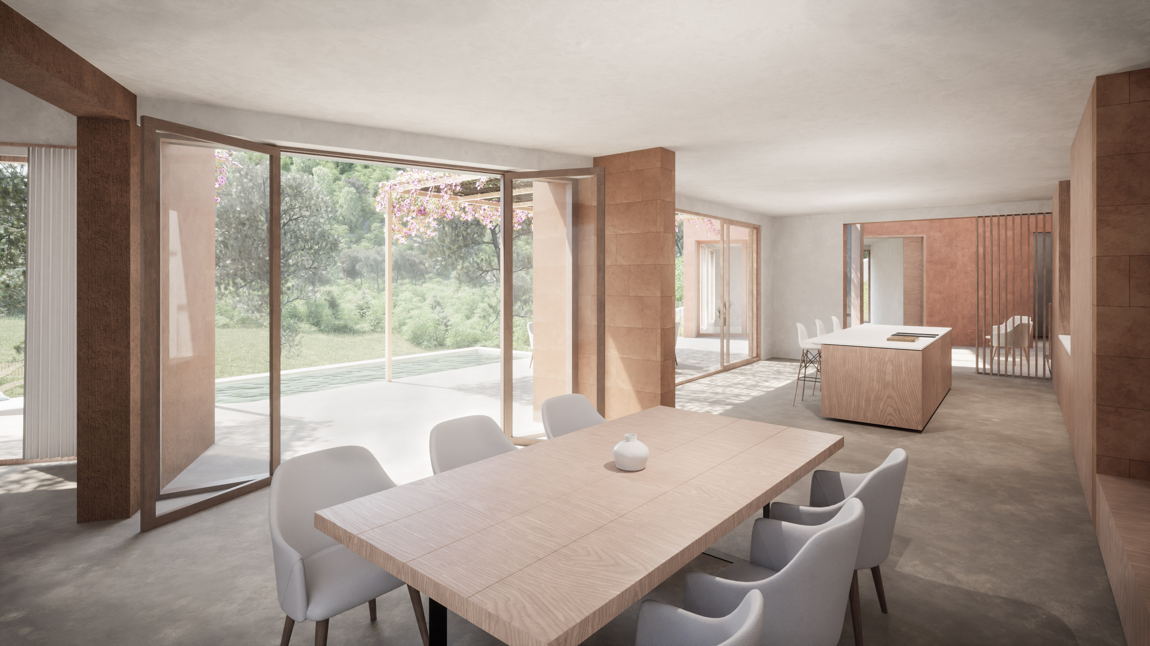 Comedor interior con vistas hacia el jardín de Villa Es Pinar
