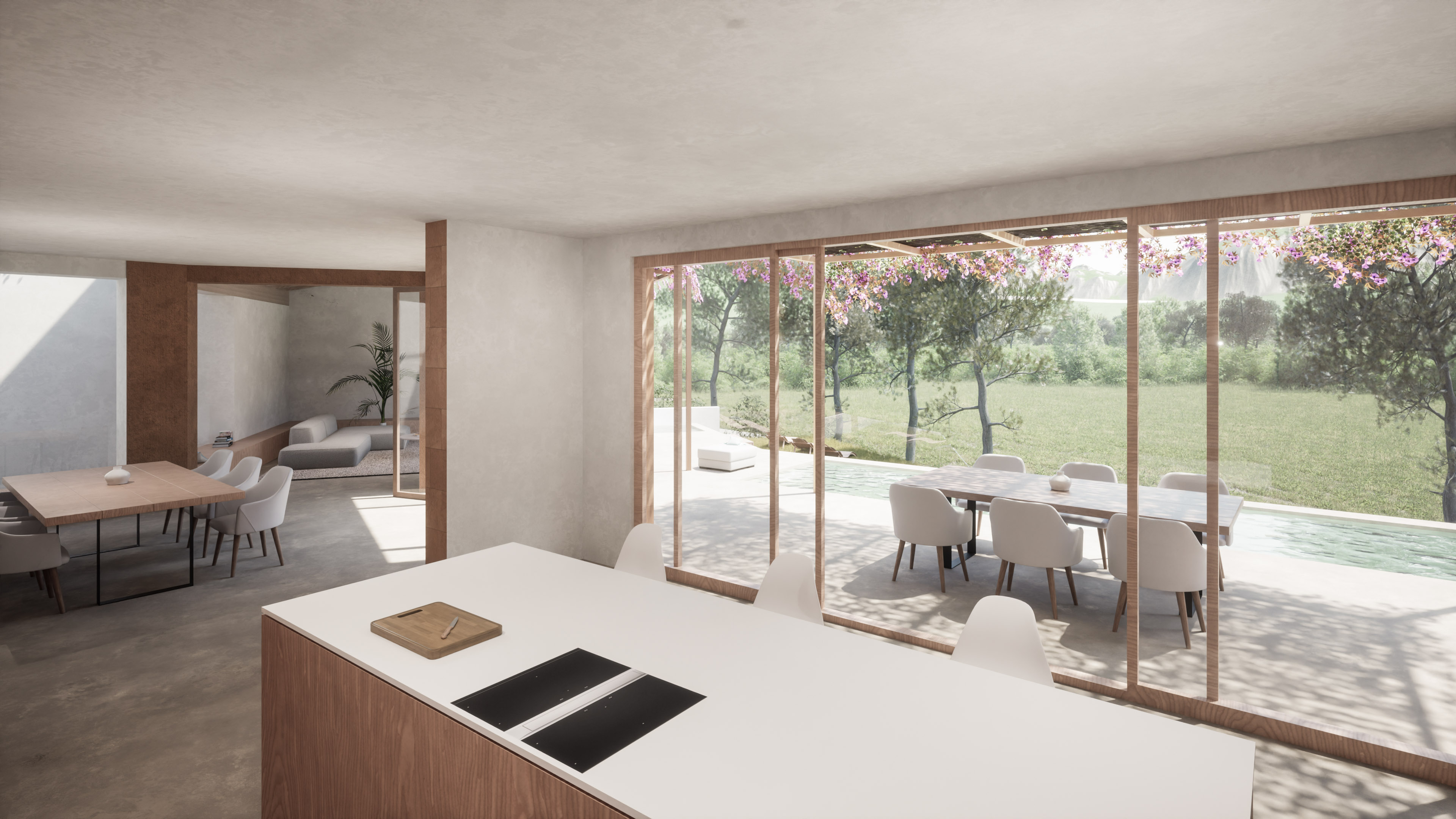 Isla de cocina con vistas al comedor exterior de Villa Es Pinar