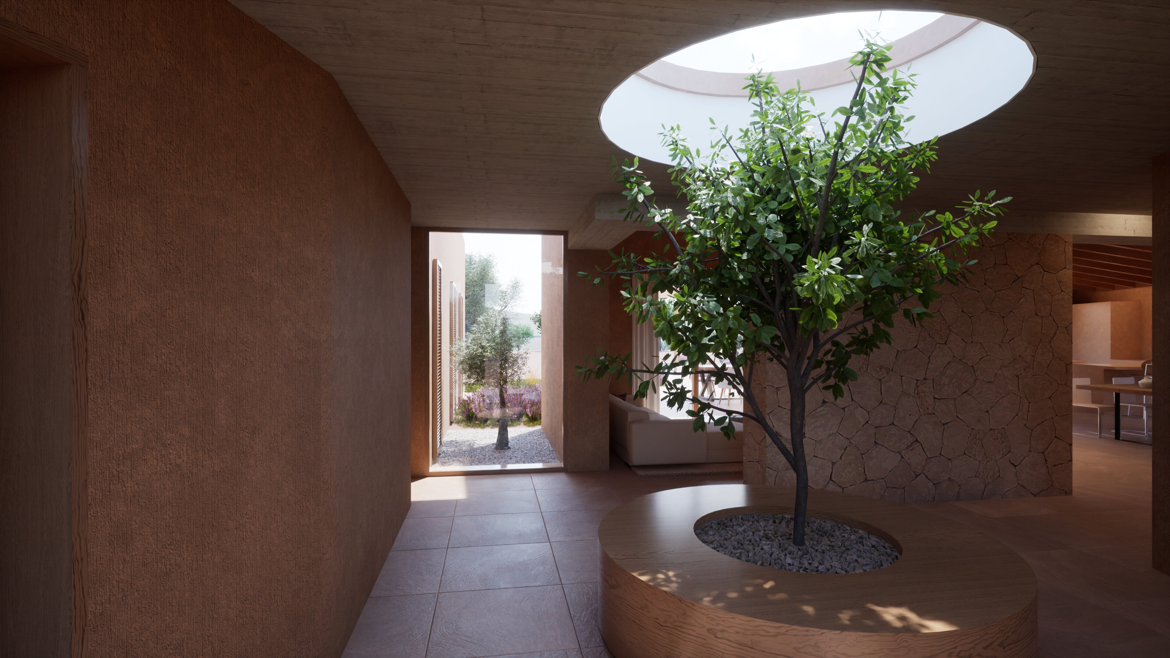 Patio interior de Finca Es Camp con árbol bajo un lucernario circular